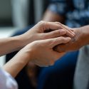 Advance requests for MAID: younger person's hands holding older person's hand